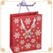 Sac de Noël rouge imprimé flocon de neige